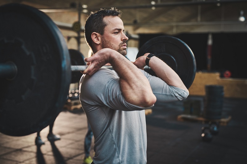 photo of a man in a front squat