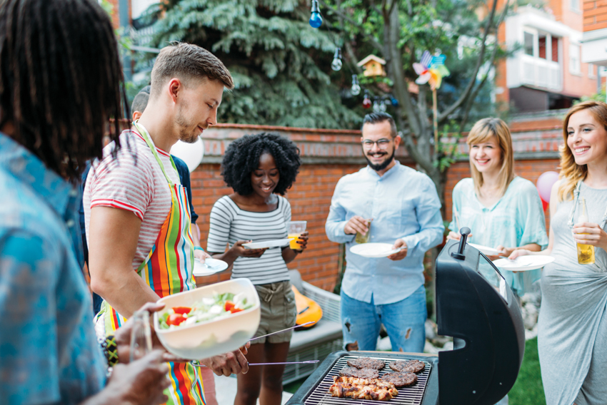 Stock photo of a backyard gathering of people