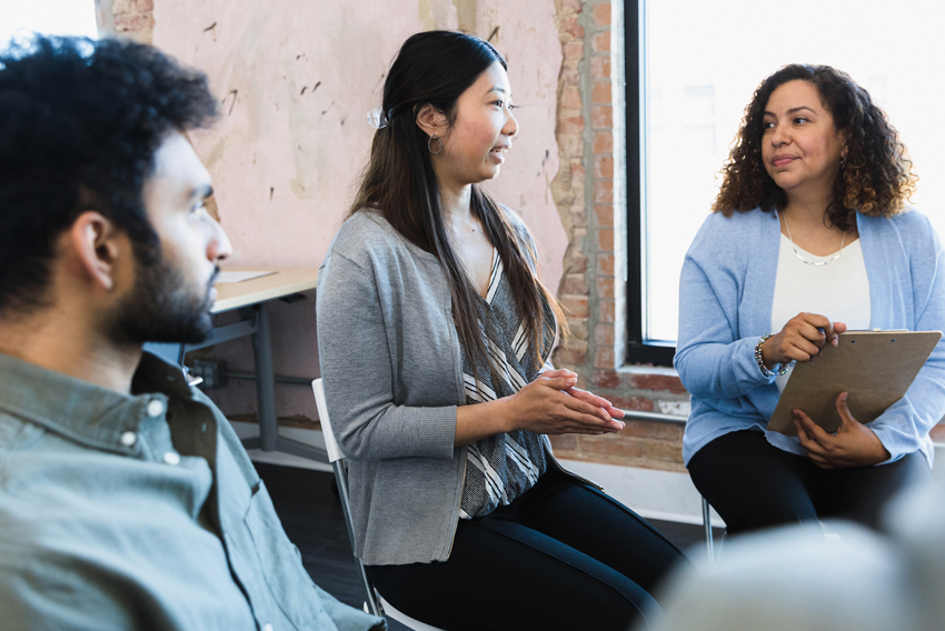 Stock photo of a group of people talking