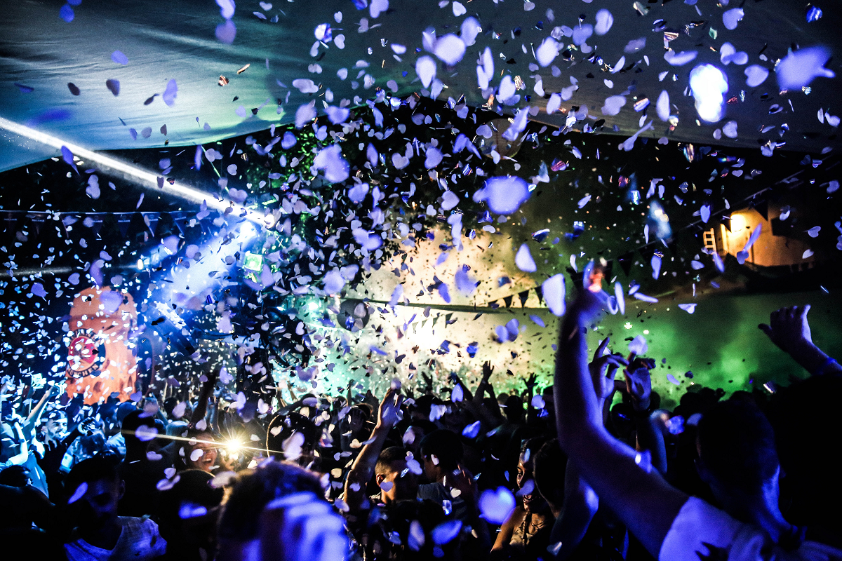 photo of people dancing at a club