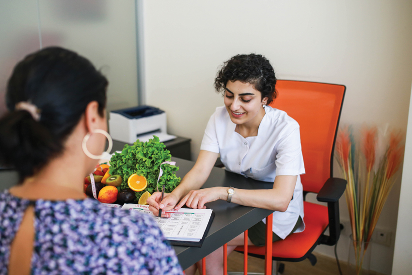 Stock photo of nutritionist and client