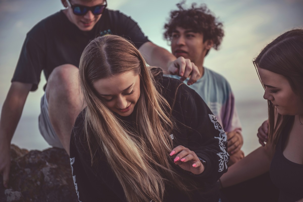 stock photo of teens at the beach