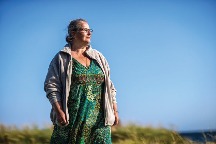 stock image of woman on a walk