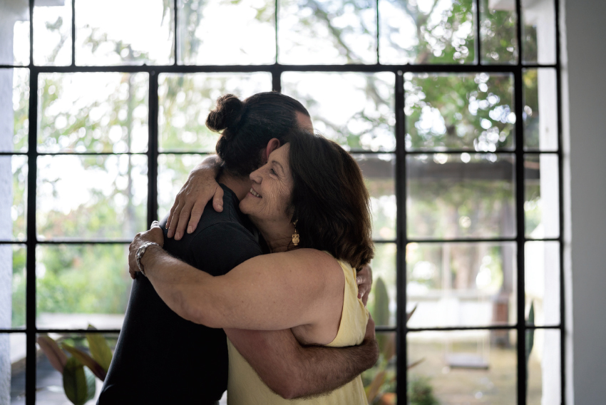 stock image of two people hugging