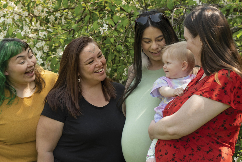 Stock photo from CIRA of a group of Indigenous women and a child